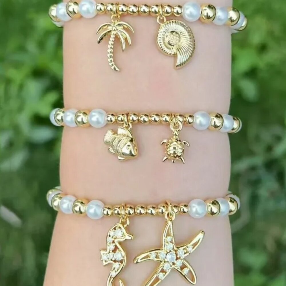 Set Beaded bracelets with nautical charms and pearls made of 18-k gold-plated
